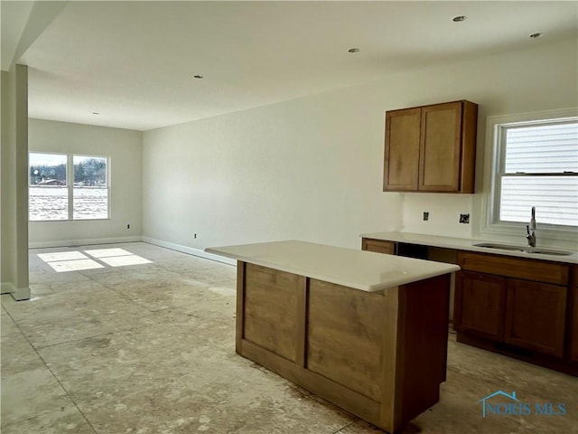 kitchen with sink and a kitchen island