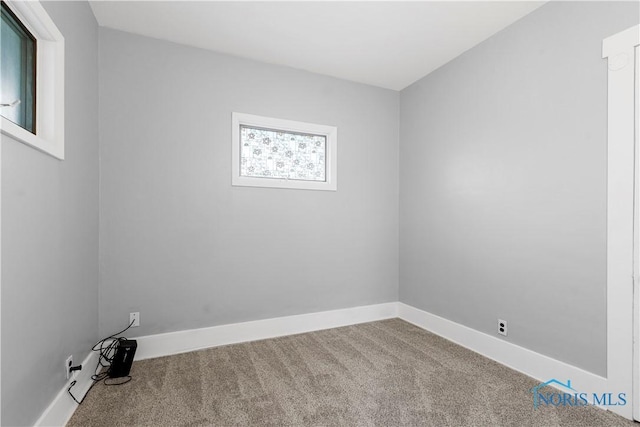 empty room with carpet floors