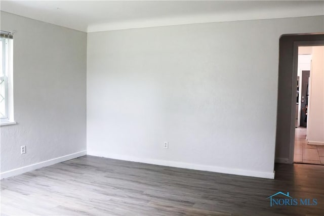 empty room featuring hardwood / wood-style floors