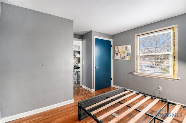 bedroom featuring hardwood / wood-style floors