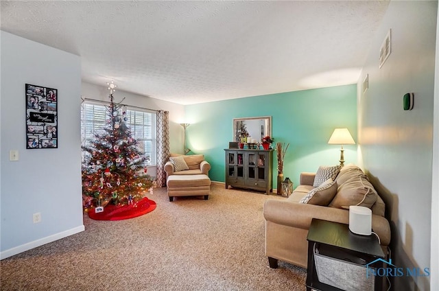 living room with carpet and a textured ceiling