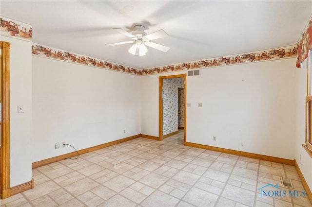 empty room featuring ceiling fan