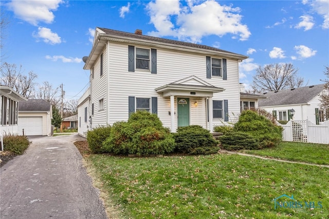 view of front of home featuring a front lawn