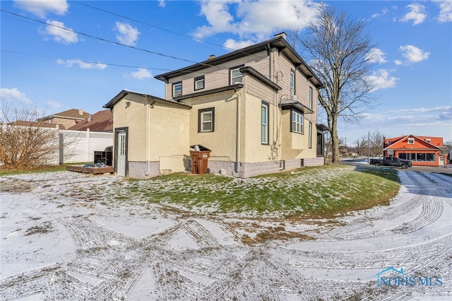 view of snow covered property