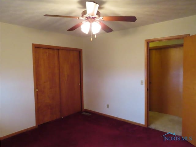 unfurnished bedroom featuring a closet and ceiling fan