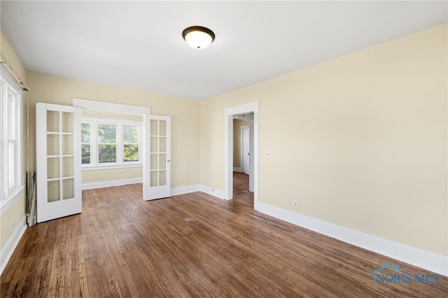 1919 Brookwood Ave, Toledo, OH 43604 - spare room featuring french doors and wood-type flooring