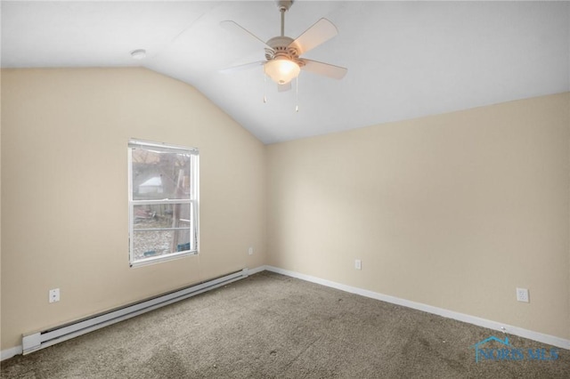 empty room featuring carpet, vaulted ceiling, baseboard heating, and ceiling fan