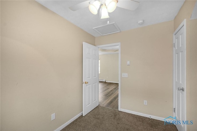 unfurnished bedroom with carpet, ceiling fan, and baseboard heating