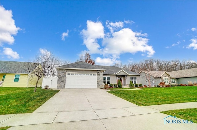 single story home featuring a garage and a front yard