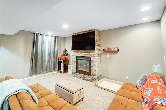 carpeted living room with a fireplace