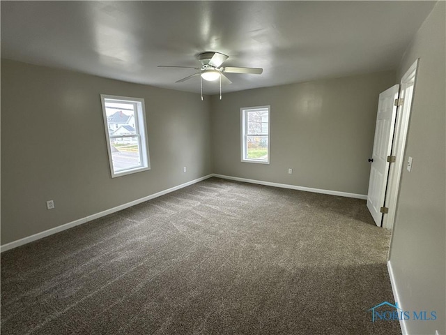 carpeted empty room with ceiling fan