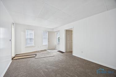 empty room with carpet floors