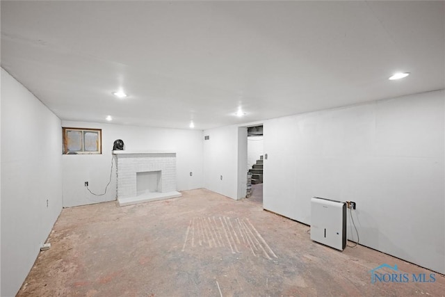 basement with a fireplace