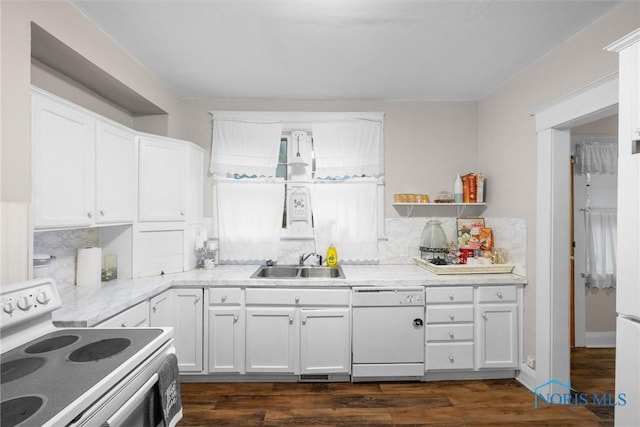 534 Acklin Ave, Toledo, OH 43620 - kitchen featuring white appliances, white cabinetry, dark wood-style floors, light countertops, and backsplash