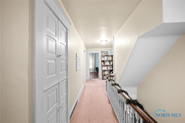 534 Acklin Ave, Toledo, OH 43620 - hall featuring light colored carpet and baseboards