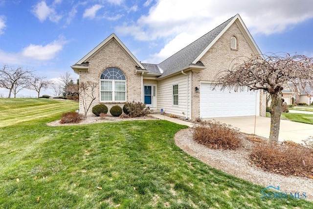 view of front facade with a garage and a front lawn