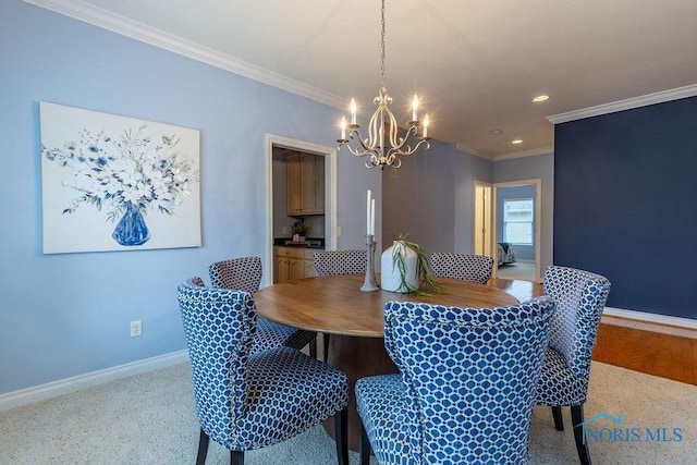 dining space featuring an inviting chandelier and crown molding