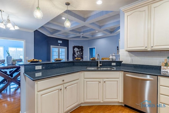 kitchen with coffered ceiling, sink, dishwasher, kitchen peninsula, and pendant lighting