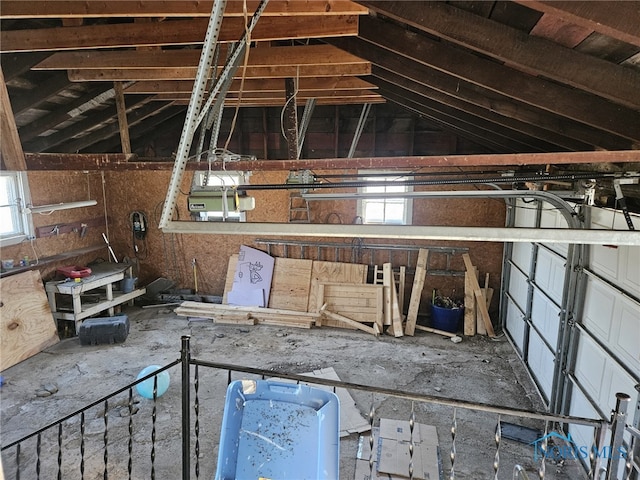 attic featuring a healthy amount of sunlight