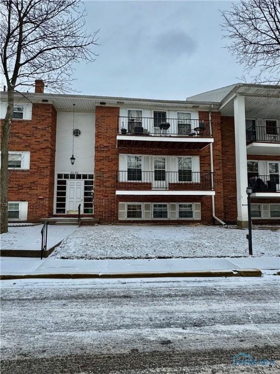 view of snow covered building