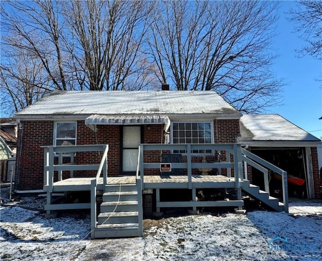 view of front of house featuring a wooden deck