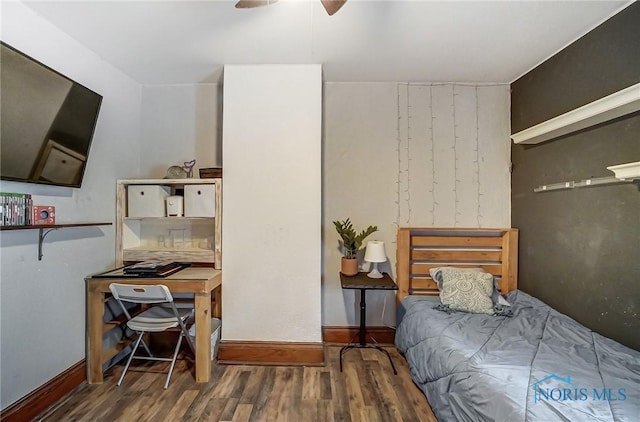 bedroom featuring ceiling fan and wood-type flooring