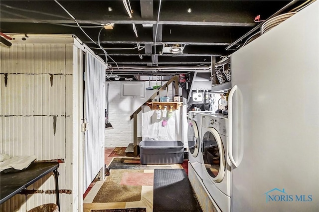 laundry area featuring independent washer and dryer