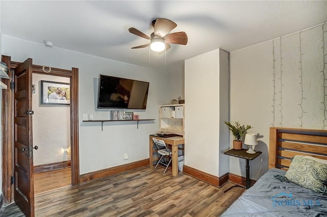 bedroom featuring ceiling fan and hardwood / wood-style flooring