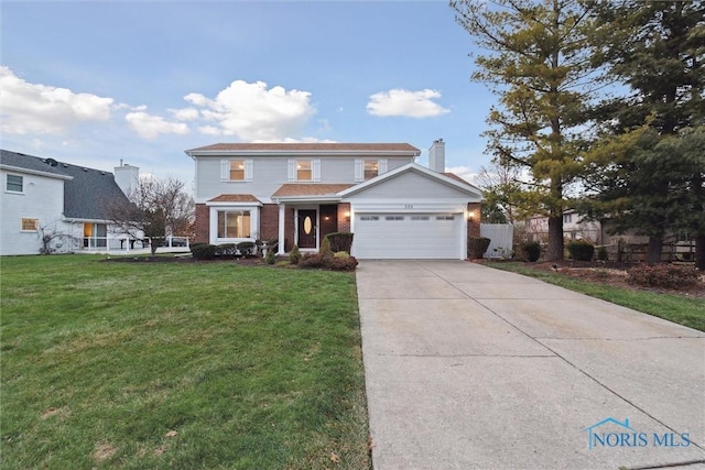 front facade featuring a garage and a front lawn