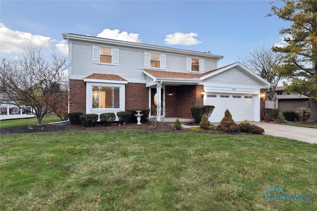 view of front property featuring a garage and a front yard