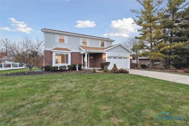 front facade with a garage and a front lawn