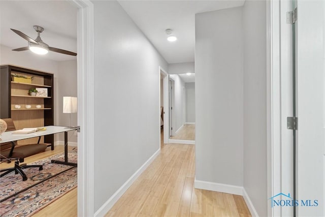 hallway featuring light hardwood / wood-style floors