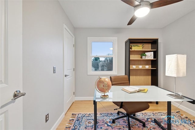 office area with ceiling fan and light wood-type flooring