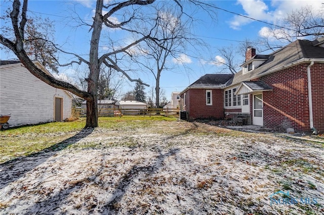 view of yard with central AC