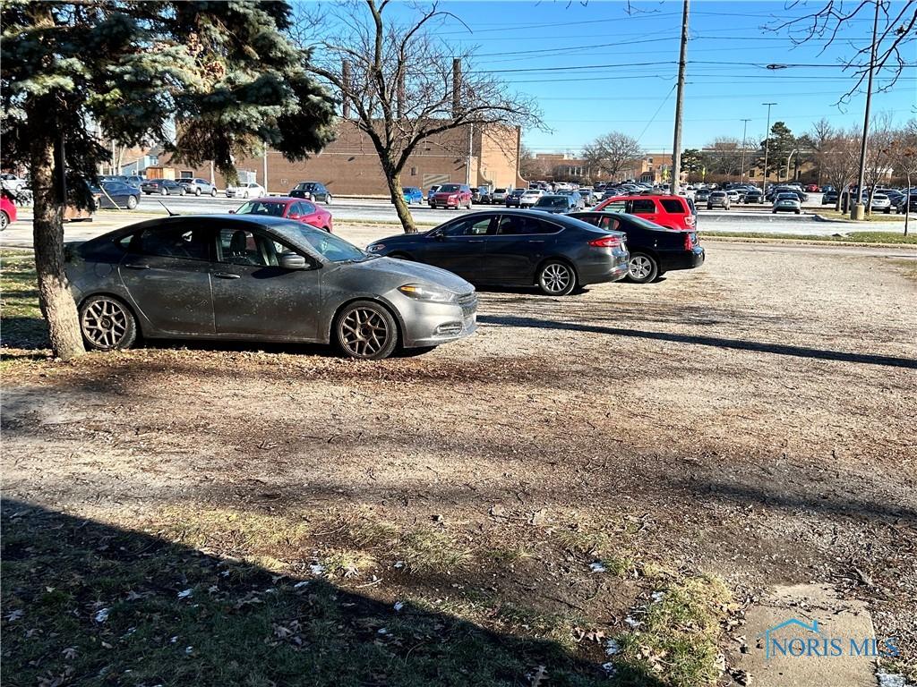 view of parking / parking lot