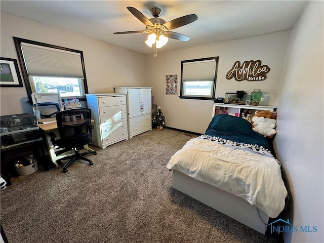 carpeted bedroom with ceiling fan