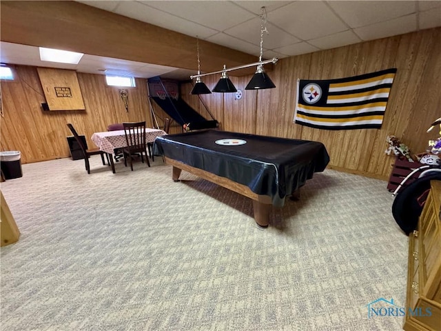 playroom featuring carpet and wood walls