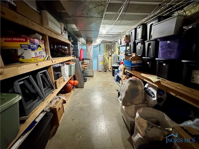 storage room with electric water heater