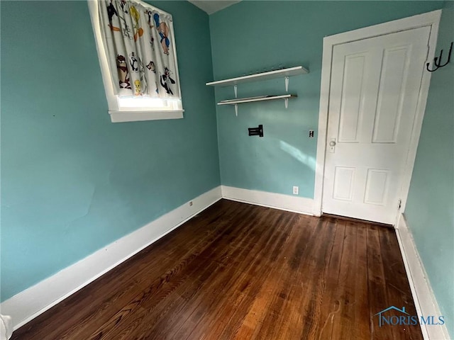 empty room featuring wood-type flooring