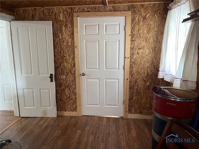 interior space with dark hardwood / wood-style floors