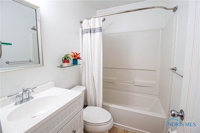 full bathroom featuring shower / bath combo, vanity, toilet, and wood-type flooring