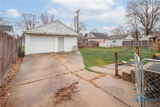 garage with a yard