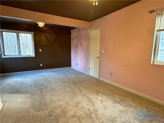 view of carpeted spare room