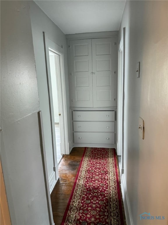 4127 Burnham Ave, Toledo, OH 43612 - corridor featuring dark wood-style flooring