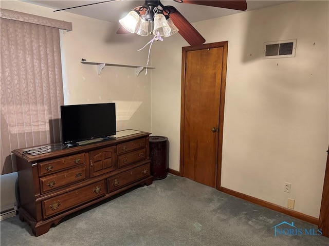 bedroom with light carpet and ceiling fan