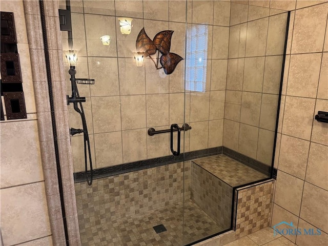 bathroom with an enclosed shower