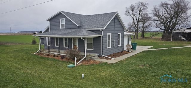 view of front of house featuring a porch and a front lawn