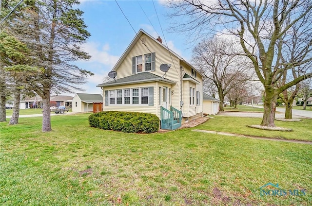 view of home's exterior featuring a yard