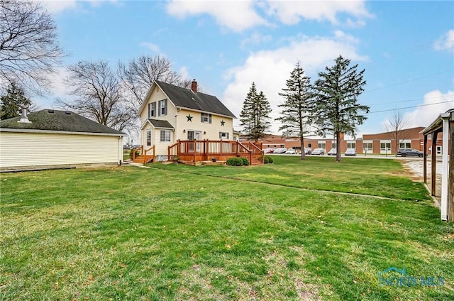 view of yard with a deck