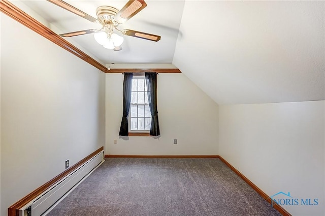 additional living space with baseboard heating, ceiling fan, carpet flooring, and lofted ceiling